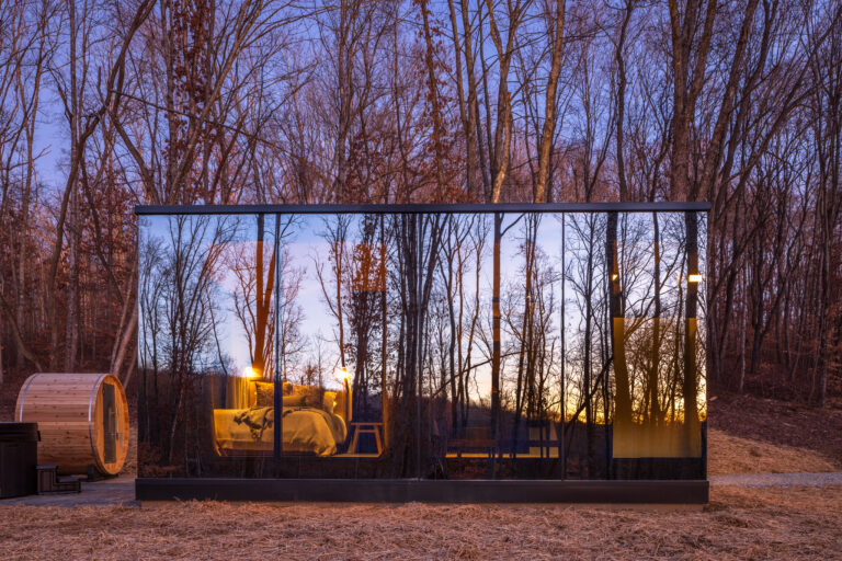 Fauna mirror cabin transforms as the sun rises