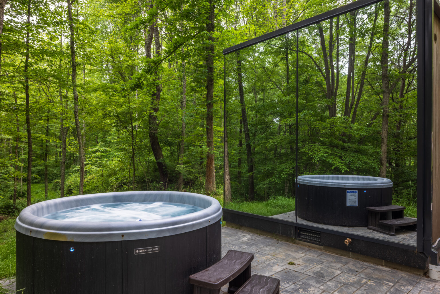 Hot tub and barrel sauna invite guests to relax and reconnect at Flora