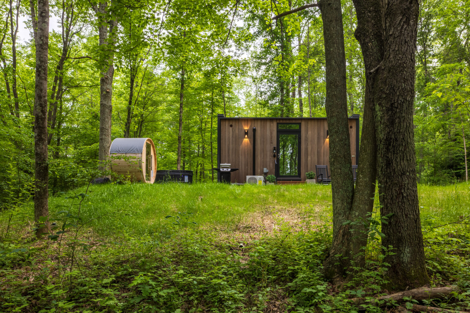 Hot tub and barrel sauna invite guests to relax and reconnect at Flora